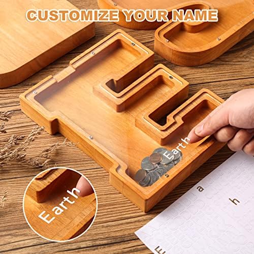 Close up of smooth oak wood craftsmanship and secure screws on letter money bank.