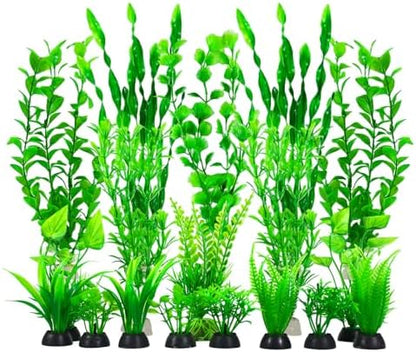 Laxmi Vishnu Enterprises plastic fish tank decor pack arranged inside a freshwater aquarium.