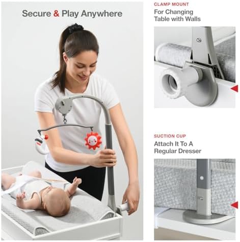 Portable toy bar with moon and sun mobile on changing pad
