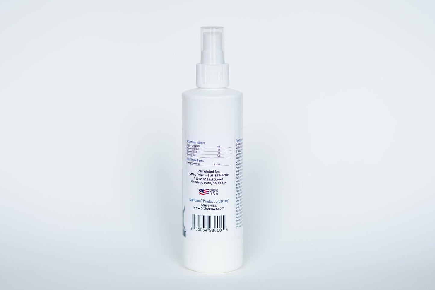 Ortho Pawz premium flea and tick protection spray bottle for home and pet use.