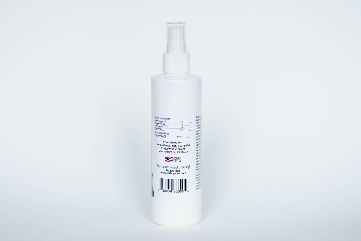 Ortho Pawz premium flea and tick protection spray bottle for home and pet use.