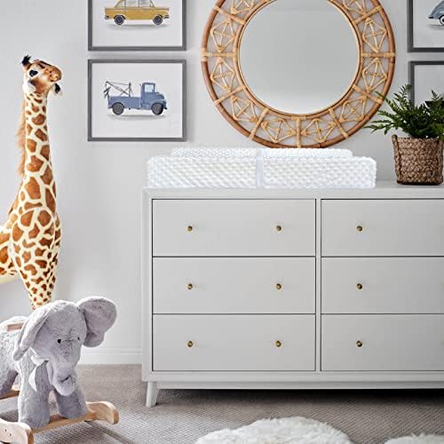 Yening foam changing pad in nursery room setting