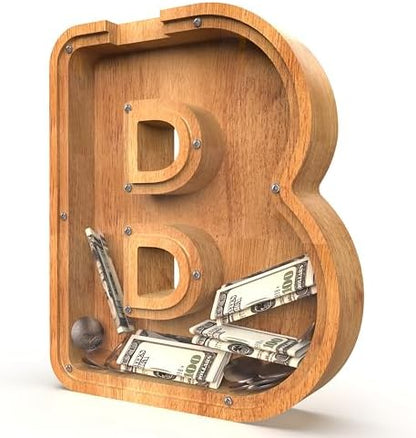Large alphabet coin savings box made of polished organic wood showing coins filling up inside the cutout letter design