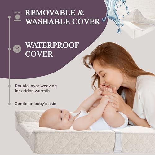 Modera contoured changing mat safety strap and non slip bottom