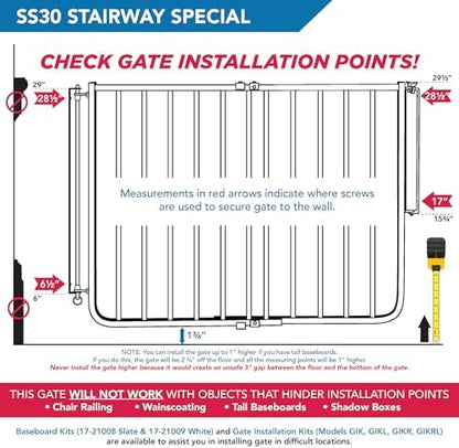 Cardinal Gates aluminum indoor pet gate mounted at an angle against a residential wall stud