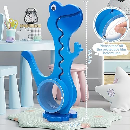 Side angle of the blue wooden dino coin bank displaying the thickness of the natural wood frame.