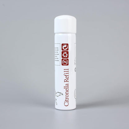 Hand holding Petbff citronella aerosol refill can