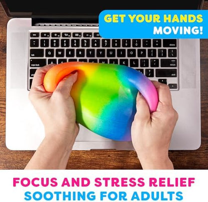 Oversized squishy sensory ball resting on an office desk as a stress relief tool for adults.