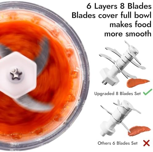 NCVI baby care puree machine surrounded by fresh ingredients like chopped carrots and apples