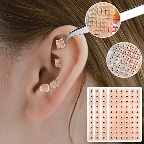 Self-adhesive magnetic ear patches for natural stress relief and wellness.