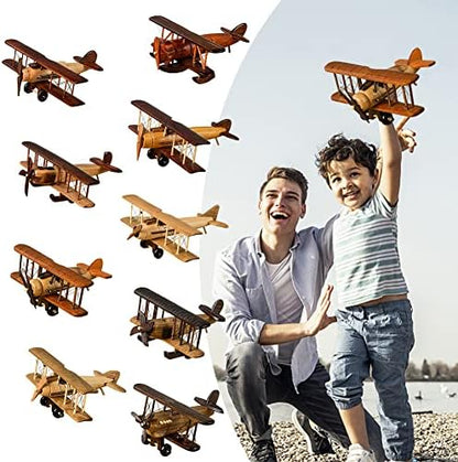 Handmade wooden biplane toy close up highlighting rustic brown finish and rigging.