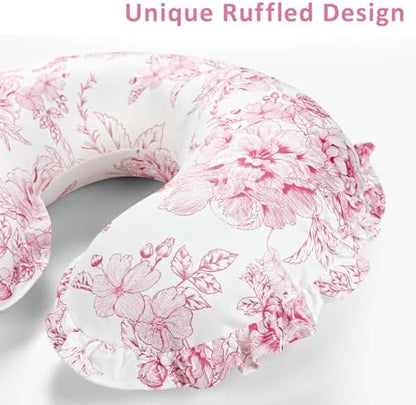 Removable floral ruffled cover on nursery pillow