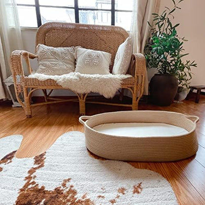 Folded Meloom baby basket being stored inside eco friendly storage bag