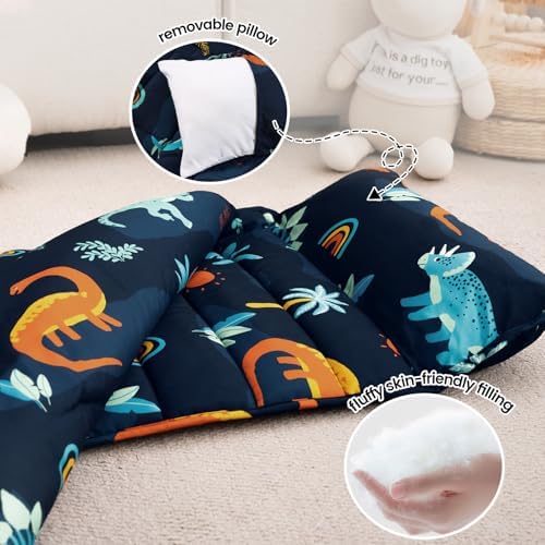 Close-up view of the soft microfiber dinosaur print fabric on the premium toddler bedding set.
