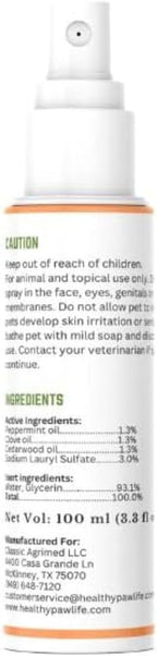 Healthy Paw Life flea and tick spray packaging on a wooden surface