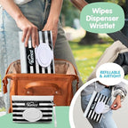 Bumco reusable wipes pouch with wristlet strap hanging on a stroller