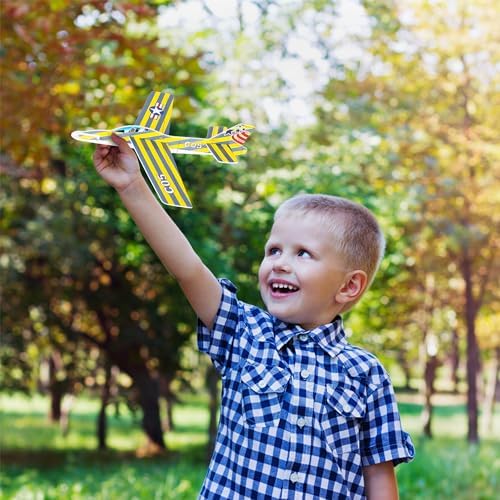 A children's group activity featuring multiple unique ArtCreativity foam fighter jets ready for outdoor flying fun