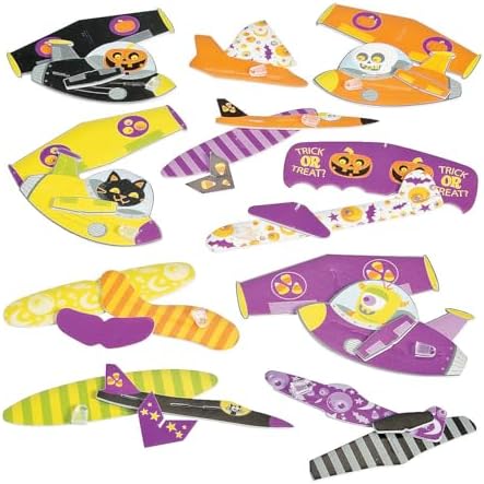 Assorted colorful spooky pumpkin and monster mini airplane gliders assembled for flight