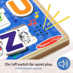 Back view of the official wooden educational alphabet toy detailing the power switch location