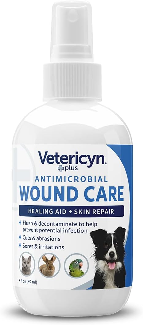 Vetericyn Plus canine healing aid liquid being applied to dog skin hot spot