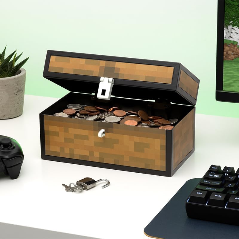 Paladone gaming room decor piggy bank showing the coin slot at the top for savings.