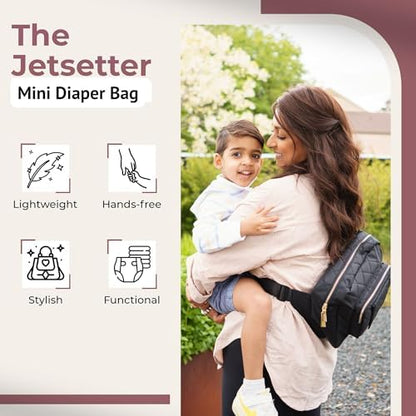 Interior pockets of Lion and Light mini diaper bag showing organization
