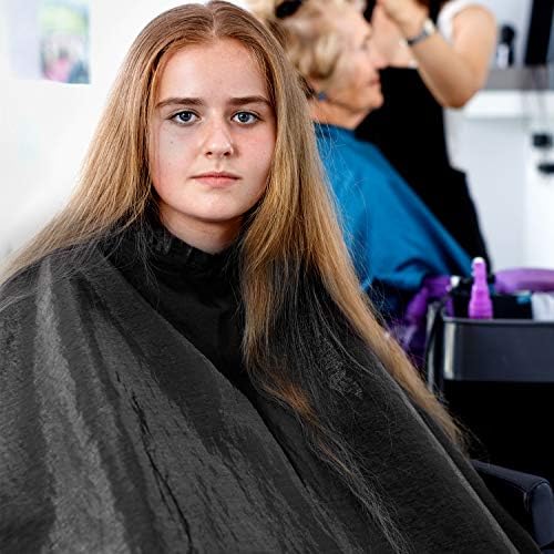 Satinior salon cape showing vintage tool graphic details