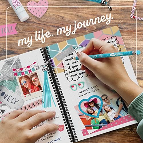 Pretty Me DIY journal kit contents including notebook and stickers