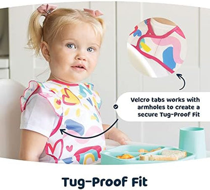 The lightweight Tiny Twinkle travel bib folded compactly for easy storage in a diaper bag.