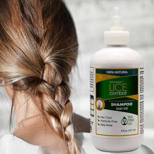 Ergonomic bamboo style handle on a professional grade dandruff removal brush.