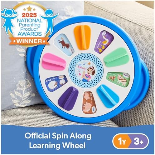 Close up of the center button and animal sound window details on the toddler toy