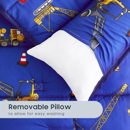 The removable plush pillow being extracted from the Wake In Cloud preschool nap mat for easy washing