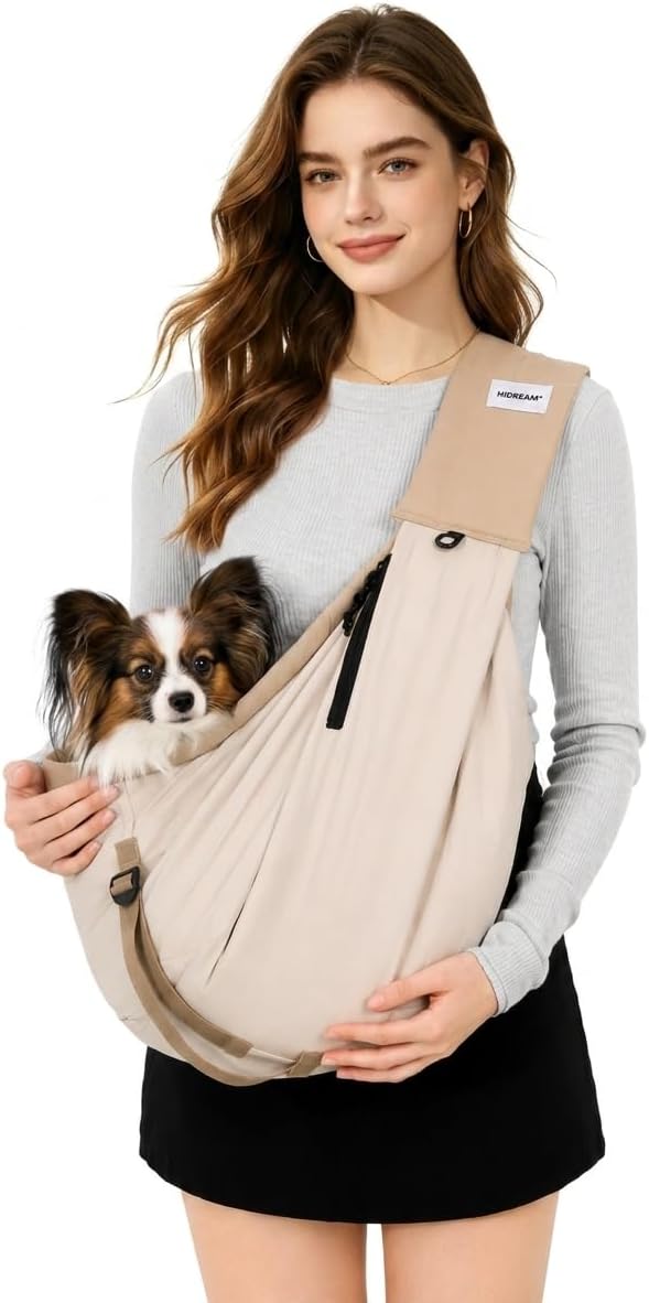 HÃ¶nPom dog sling carrier being worn for pet comfort