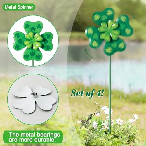 Close up of green metal clover wind spinner art