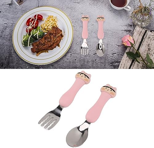Childrens eating utensils with cartoon animal design close up