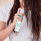 Back view of Not Your Mother's Hair Perfector bottle showing ingredient list and detailed application instructions