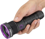 Yellow tinted UV protective safety glasses side by side with the high output blacklight flashlight.