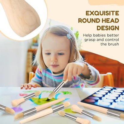 A young toddler holding the easy grip chubby wood handle paint brush
