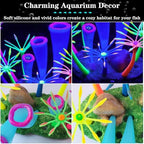 Purple artificial soft coral plant ornament inside a small fish bowl
