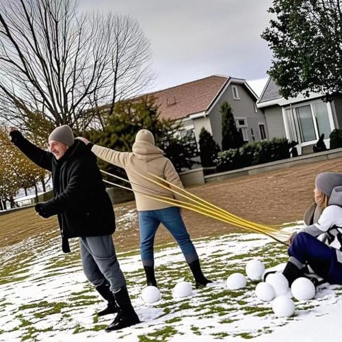 Adults launching a promotional t shirt at an outdoor lawn event using the giant slingshot