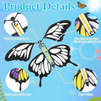Hand winding the head of a paper butterfly to prime the flying mechanism