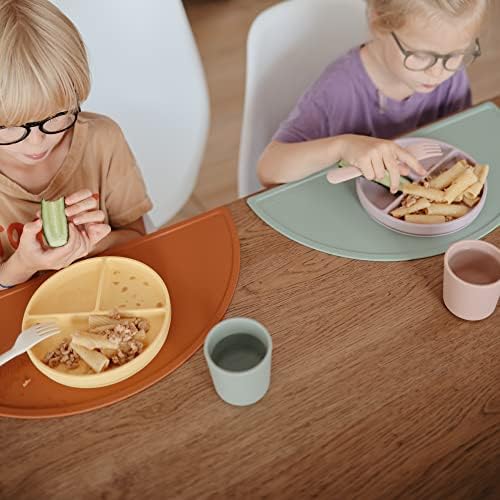 Toddler setting with the stain resistant silicone mealtime mat on a highchair tray