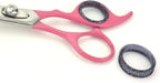 Anxious cat being calmly groomed with the pink Scaredy Cut manual silent clipper alternative.