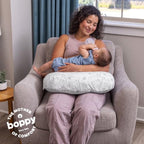 Boppy nursing pillow showing high lift support for baby
