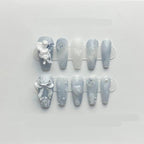 ZIIVIEVS handmade blue nail patches front view showcasing 3D angel designs