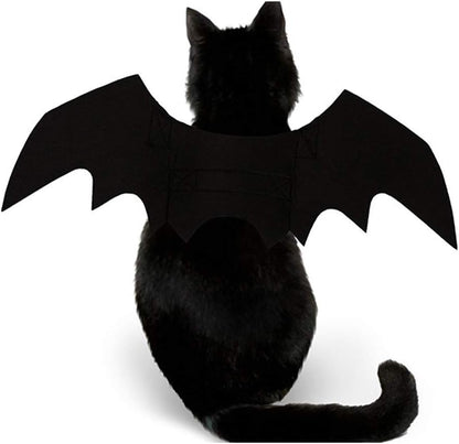 Adjustable straps on black felt bat wings for cats