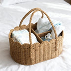 Top down view of organized diaper caddy with removable divider