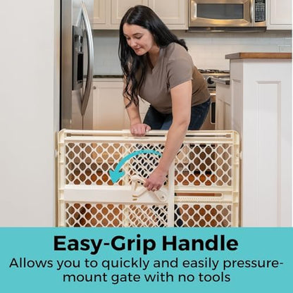 Toddleroo by North States adjustable barrier expanded to forty two inches wide in a doorway.