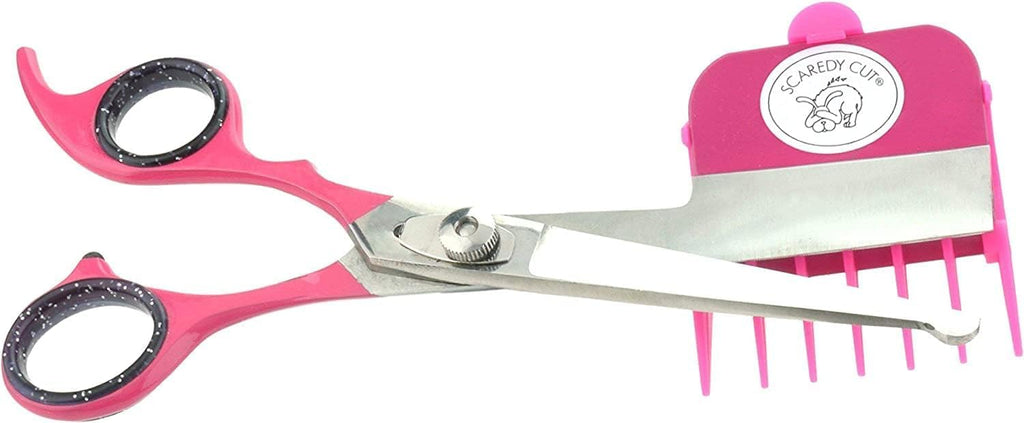 Close up of Scaredy Cut silent pet scissors with pink gel finger inserts for comfortable left handed grooming.