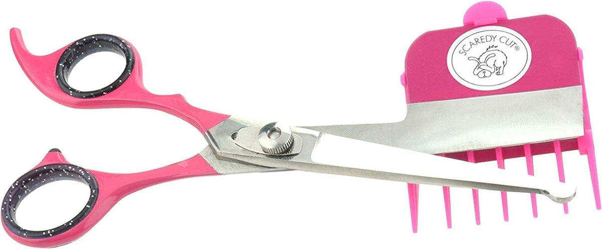Close up of Scaredy Cut silent pet scissors with pink gel finger inserts for comfortable left handed grooming.